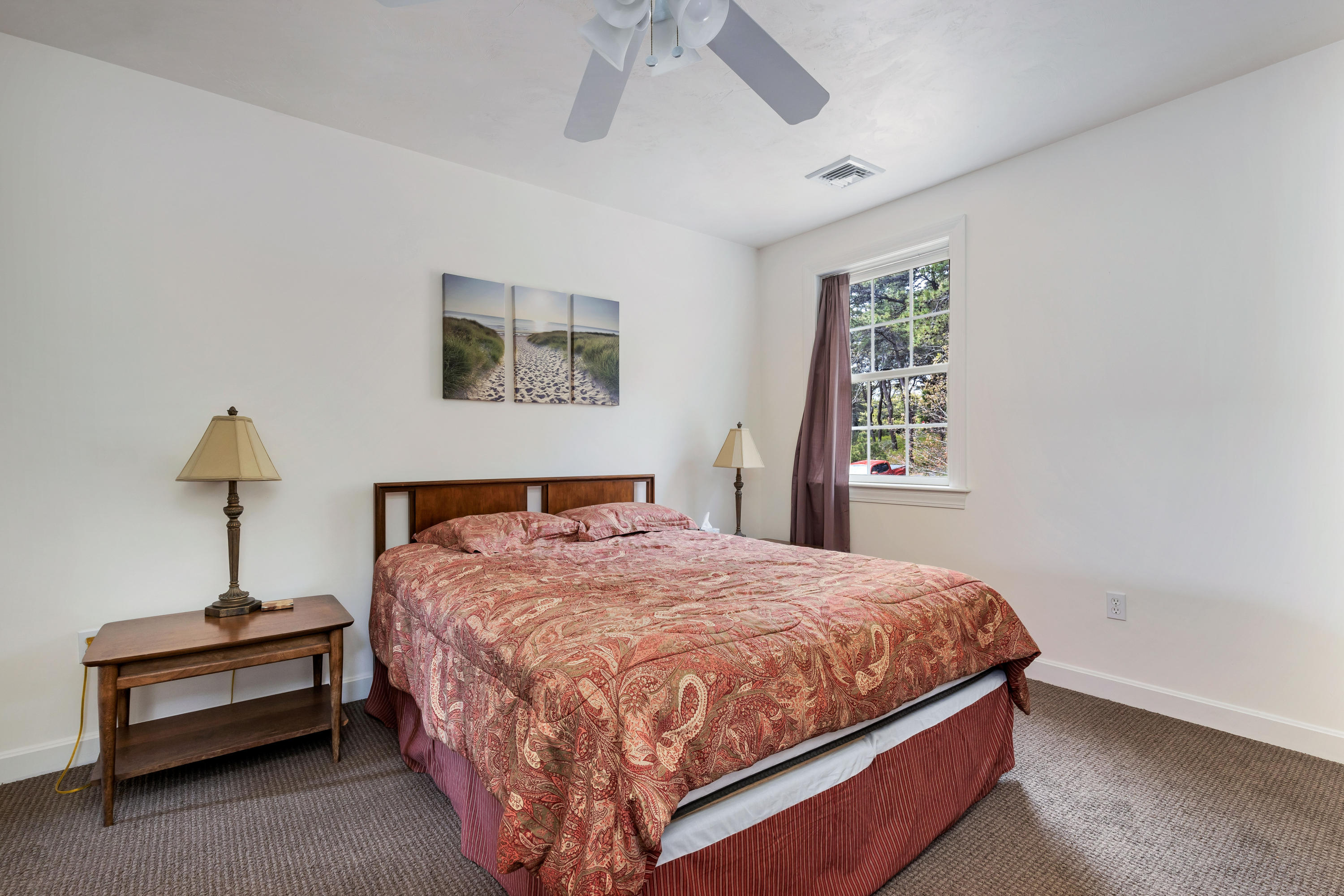 39 South Highland Road Truro, MA 02666 - Photo 28 of 46 a bedroom with a bed and a window