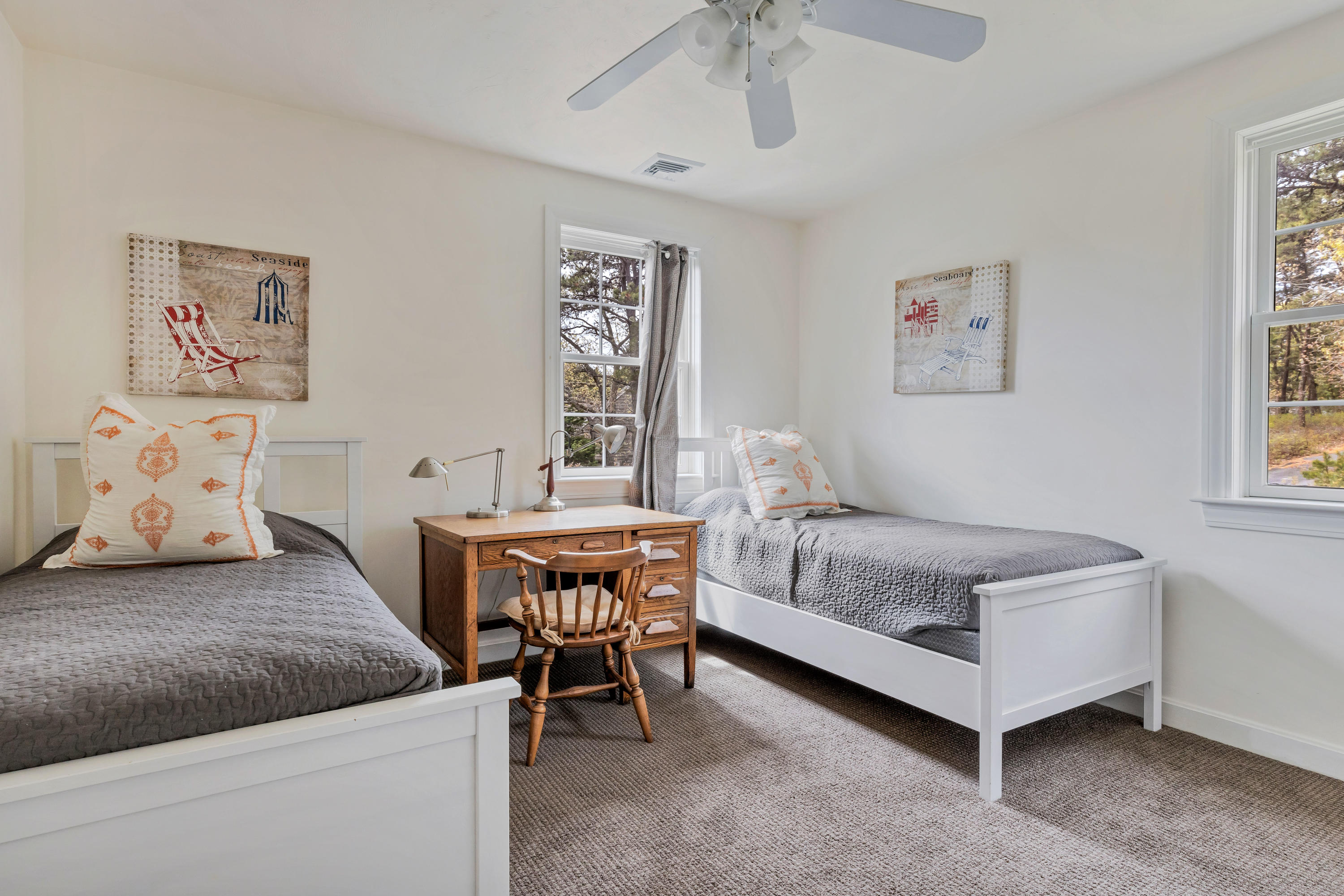 39 South Highland Road Truro, MA 02666 - Photo 30 of 46 a bedroom with a bed and a table in it