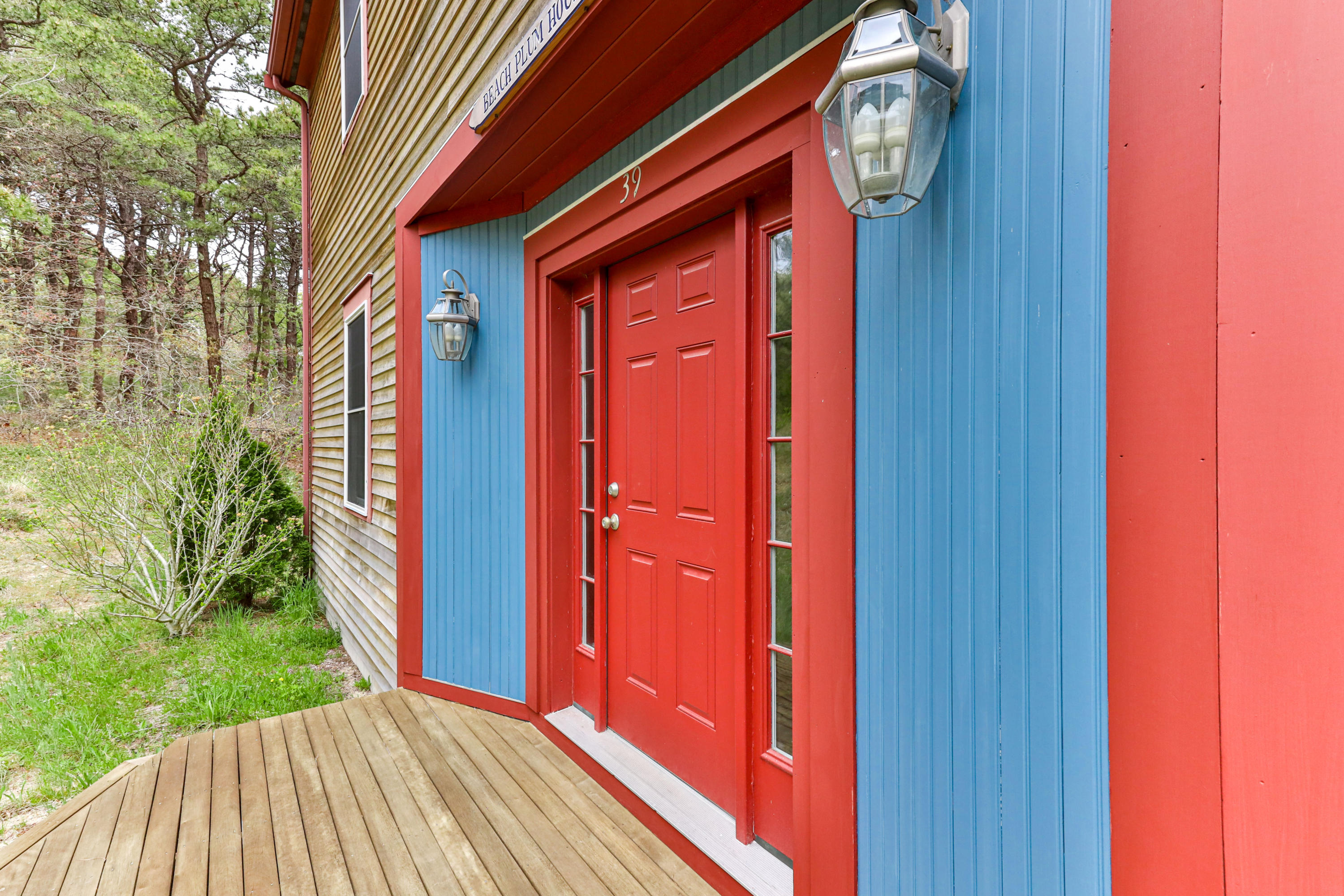 39 South Highland Road Truro, MA 02666 - Photo 6 of 46 a view of a house with a wooden door