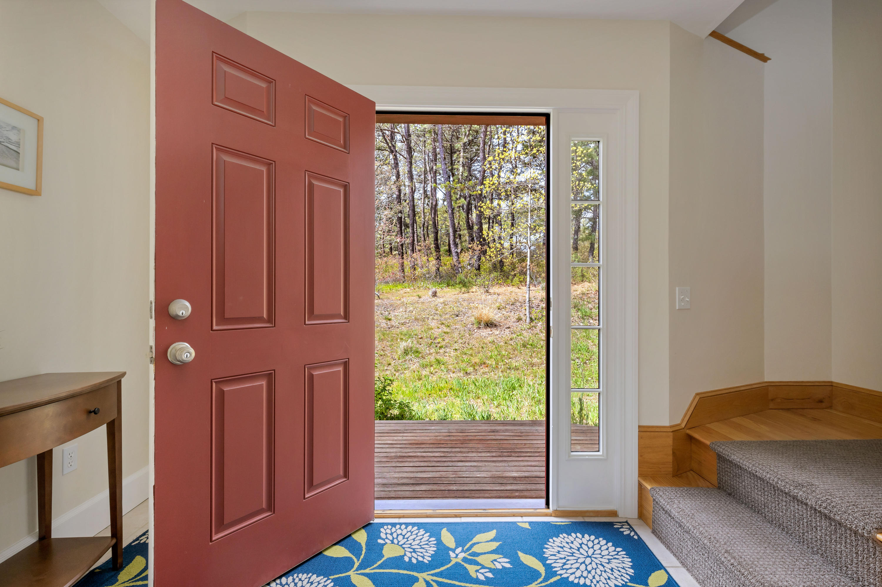 39 South Highland Road Truro, MA 02666 - Photo 8 of 46 a bedroom with a bed and wooden floor