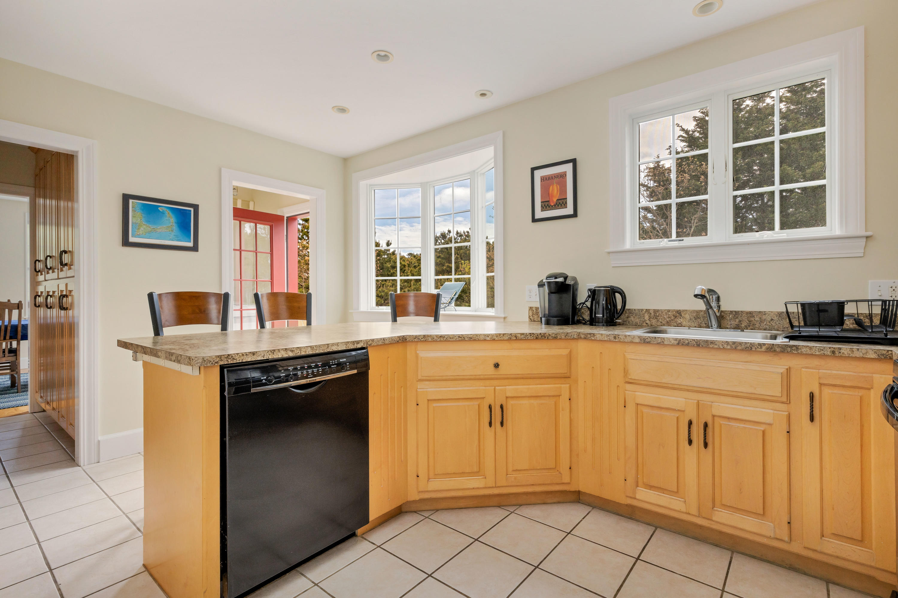 39 South Highland Road Truro, MA 02666 - Photo 9 of 46 a kitchen with stainless steel appliances granite countertop a stove and a sink