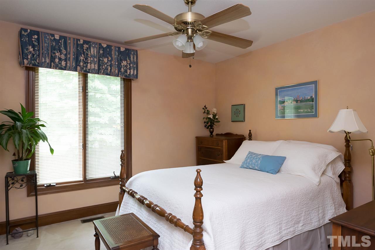 3020 Daventry Lane Raleigh, NC 27613 - Photo 17 of 25 a bedroom with a bed and a window