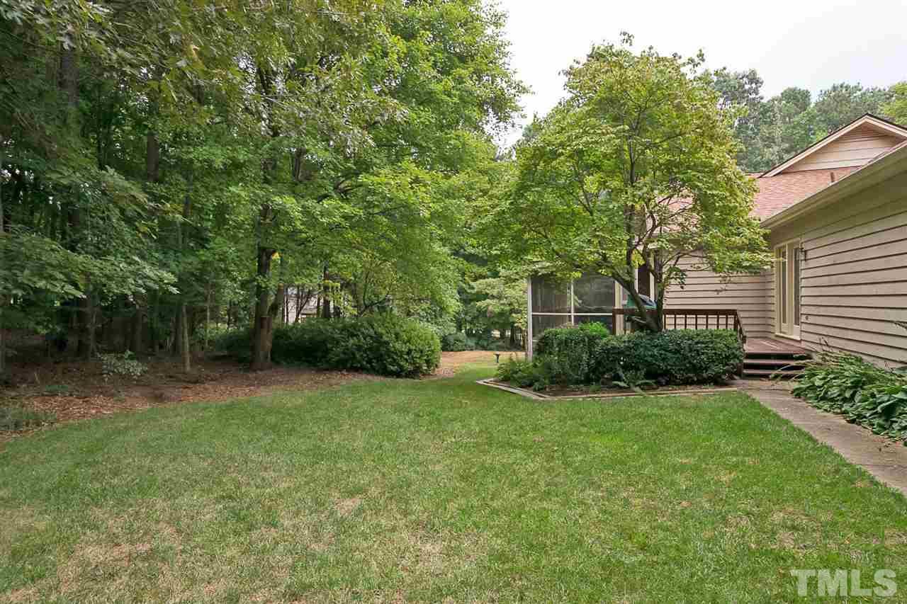 3020 Daventry Lane Raleigh, NC 27613 - Photo 25 of 25 a view of a house with a yard