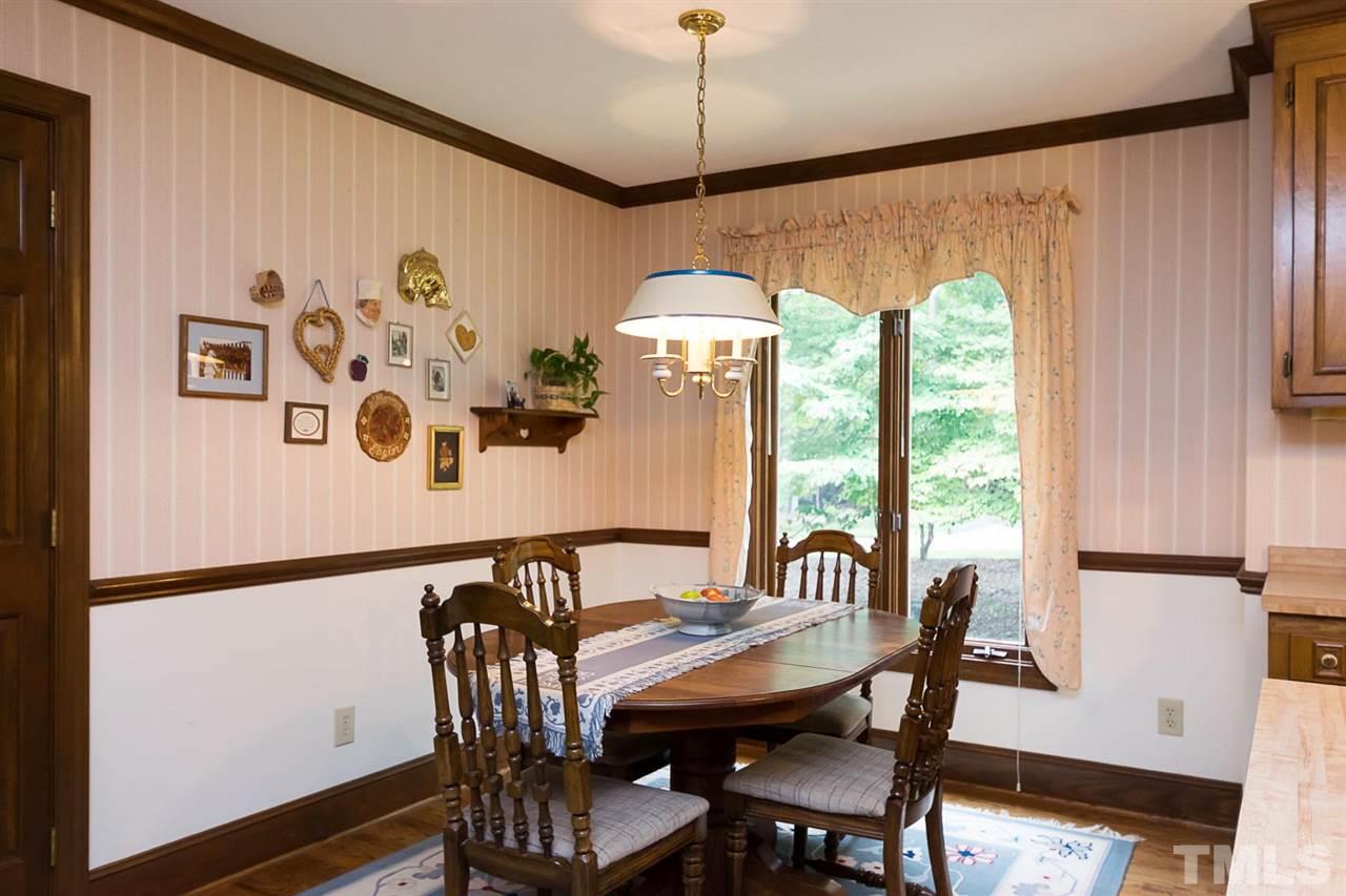 3020 Daventry Lane Raleigh, NC 27613 - Photo 6 of 25 a view of a dining room with furniture window and outside view