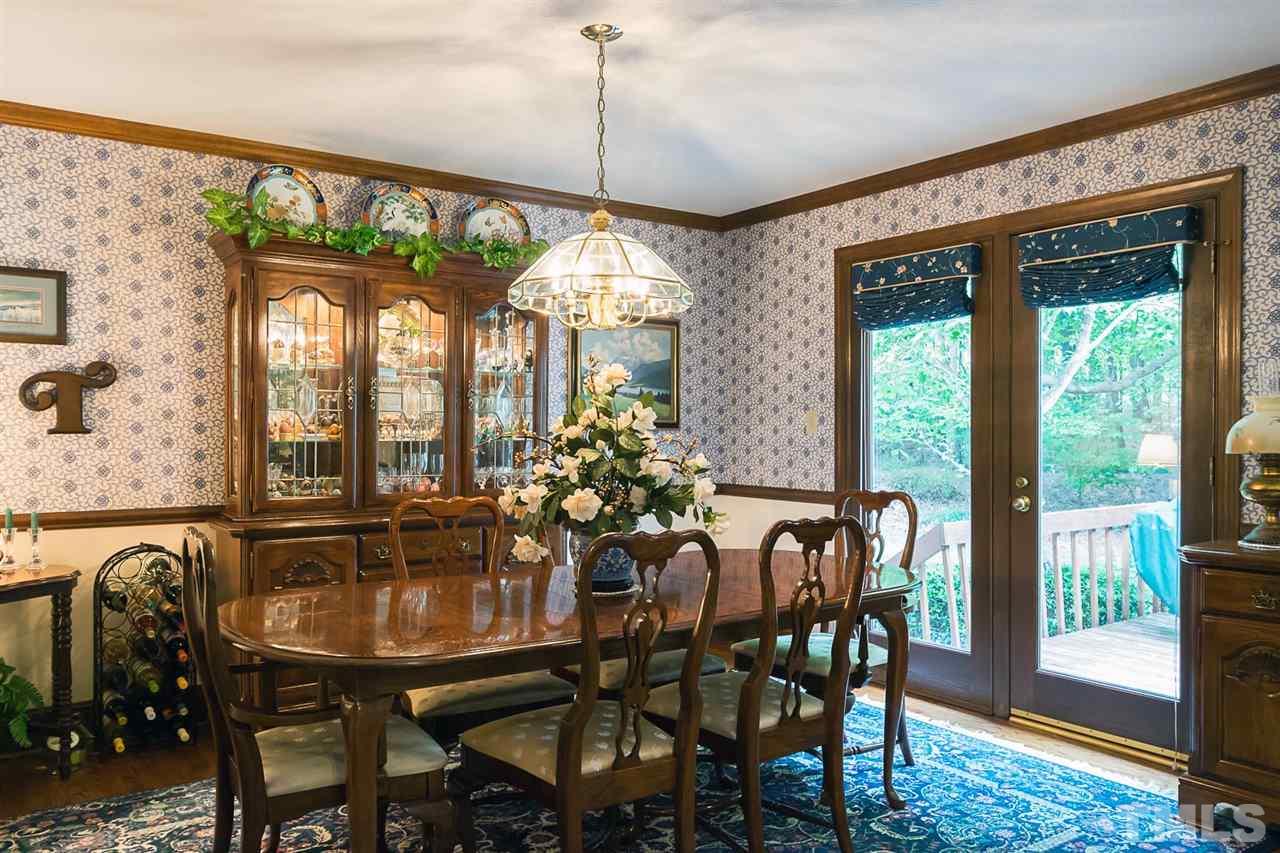 3020 Daventry Lane Raleigh, NC 27613 - Photo 10 of 25 a view of a dining room with furniture window and outside view