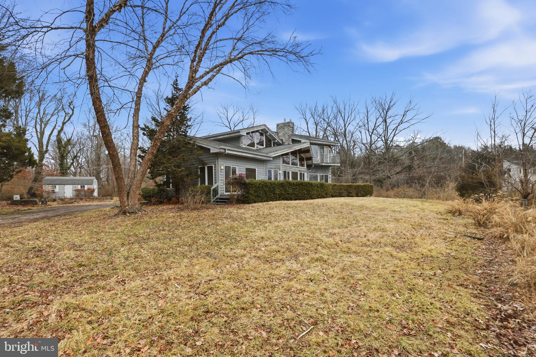 5931 Tyler Road Deale, MD 20751 - Photo 11 of 77 a front view of a house with a yard
