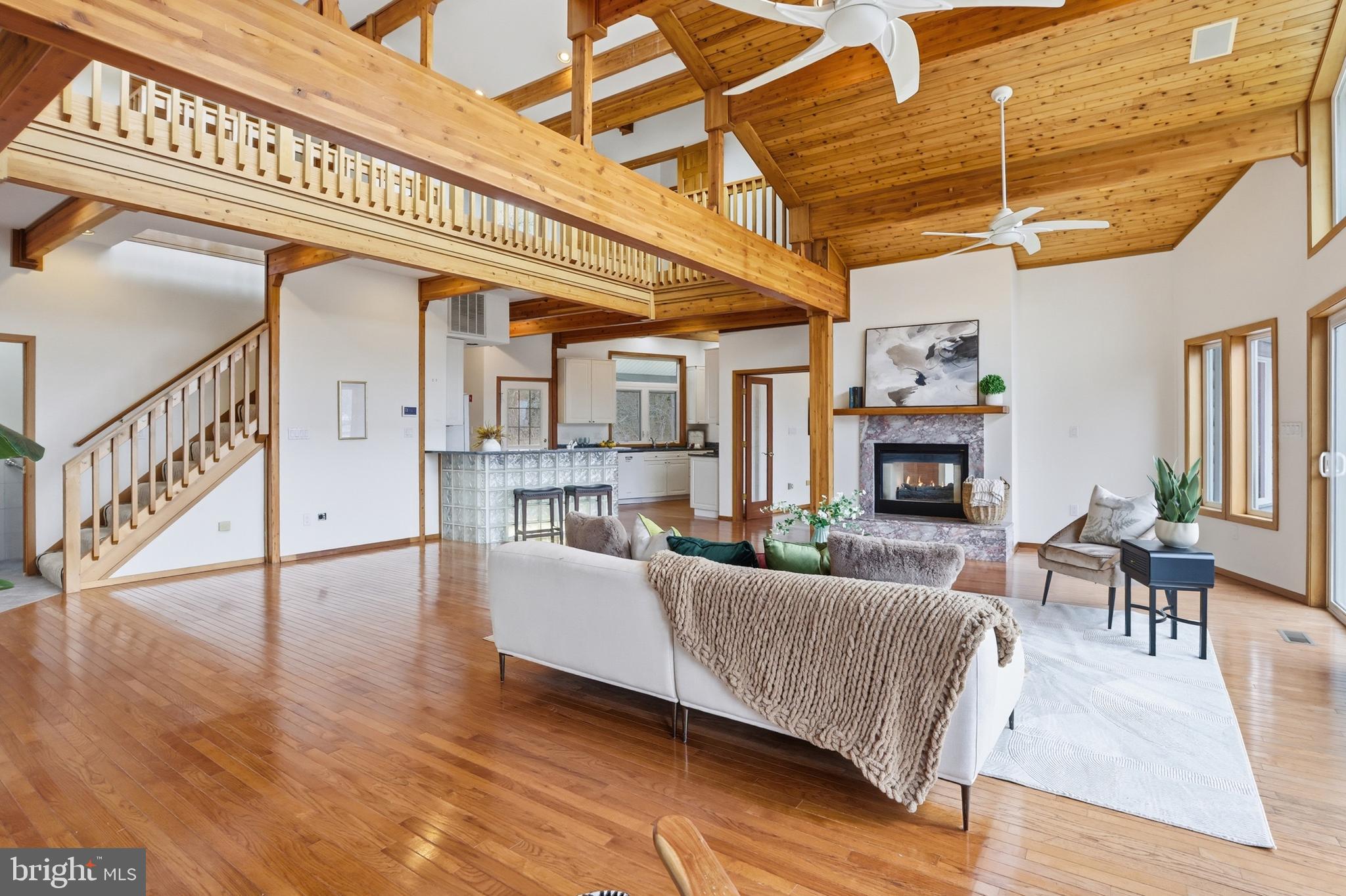 5931 Tyler Road Deale, MD 20751 - Photo 16 of 77 a living room with furniture and a fireplace