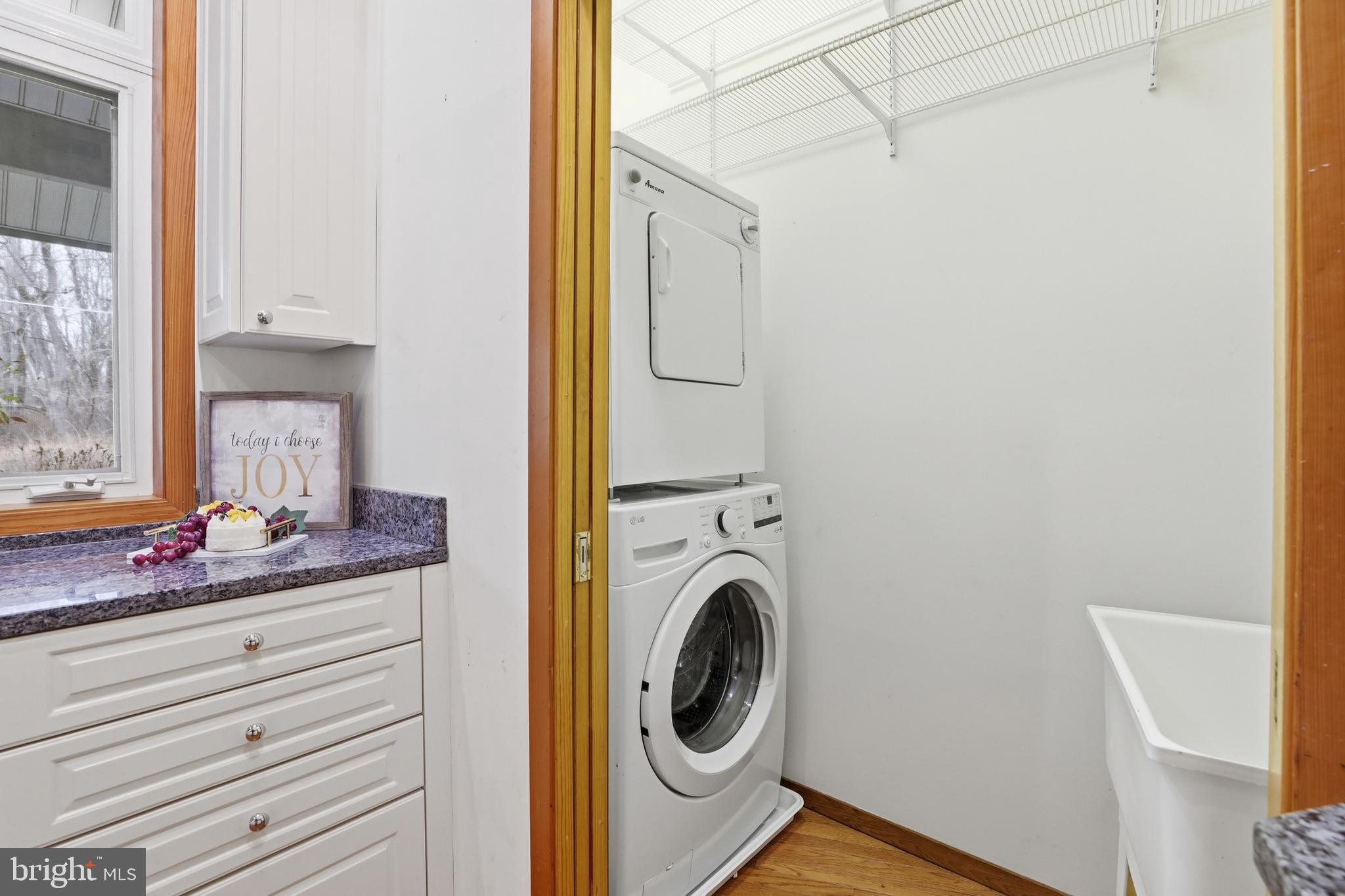5931 Tyler Road Deale, MD 20751 - Photo 22 of 77 a bathroom with a sink and a mirror