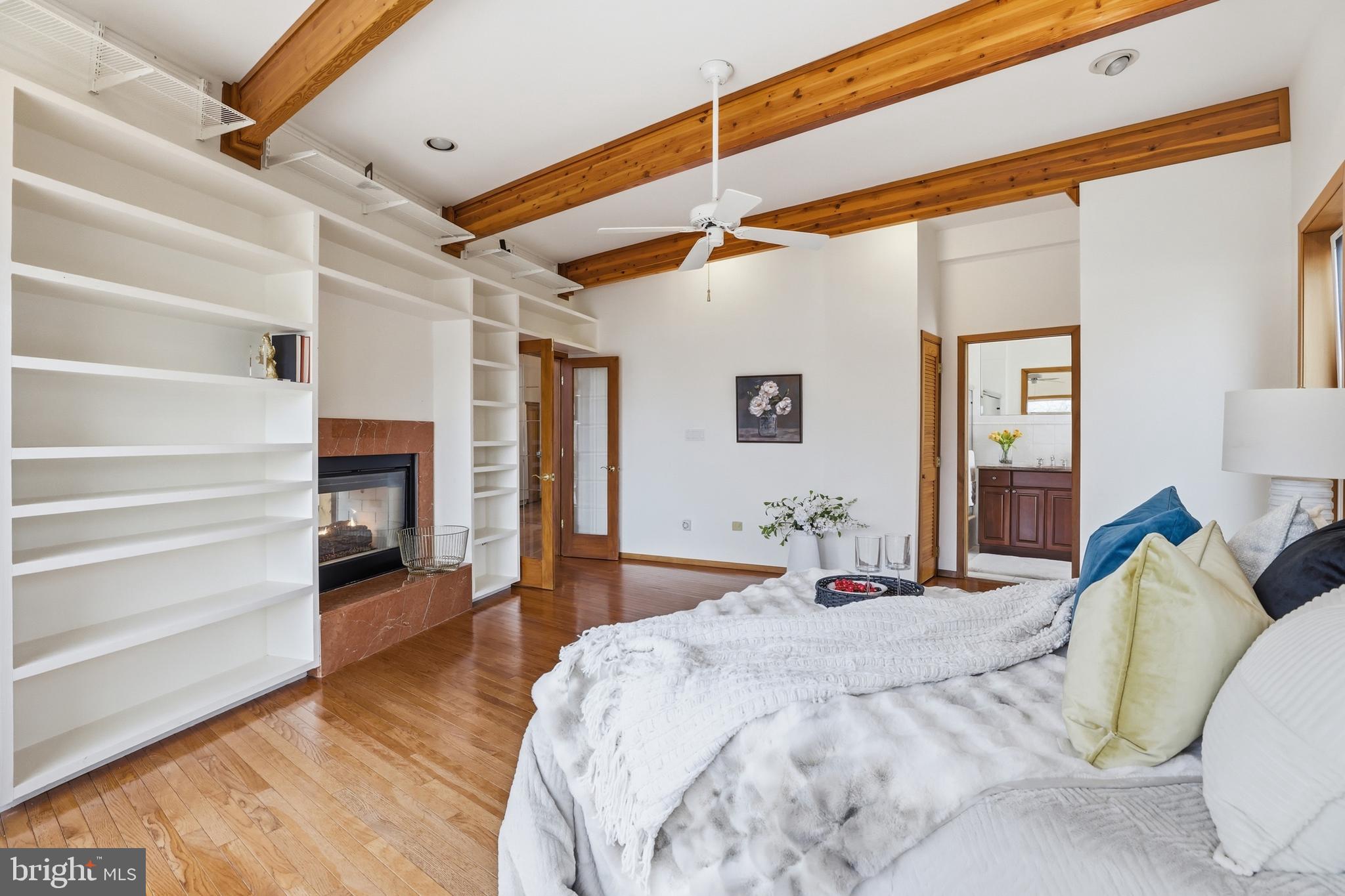 5931 Tyler Road Deale, MD 20751 - Photo 33 of 77 a bedroom with a bed and wooden floor