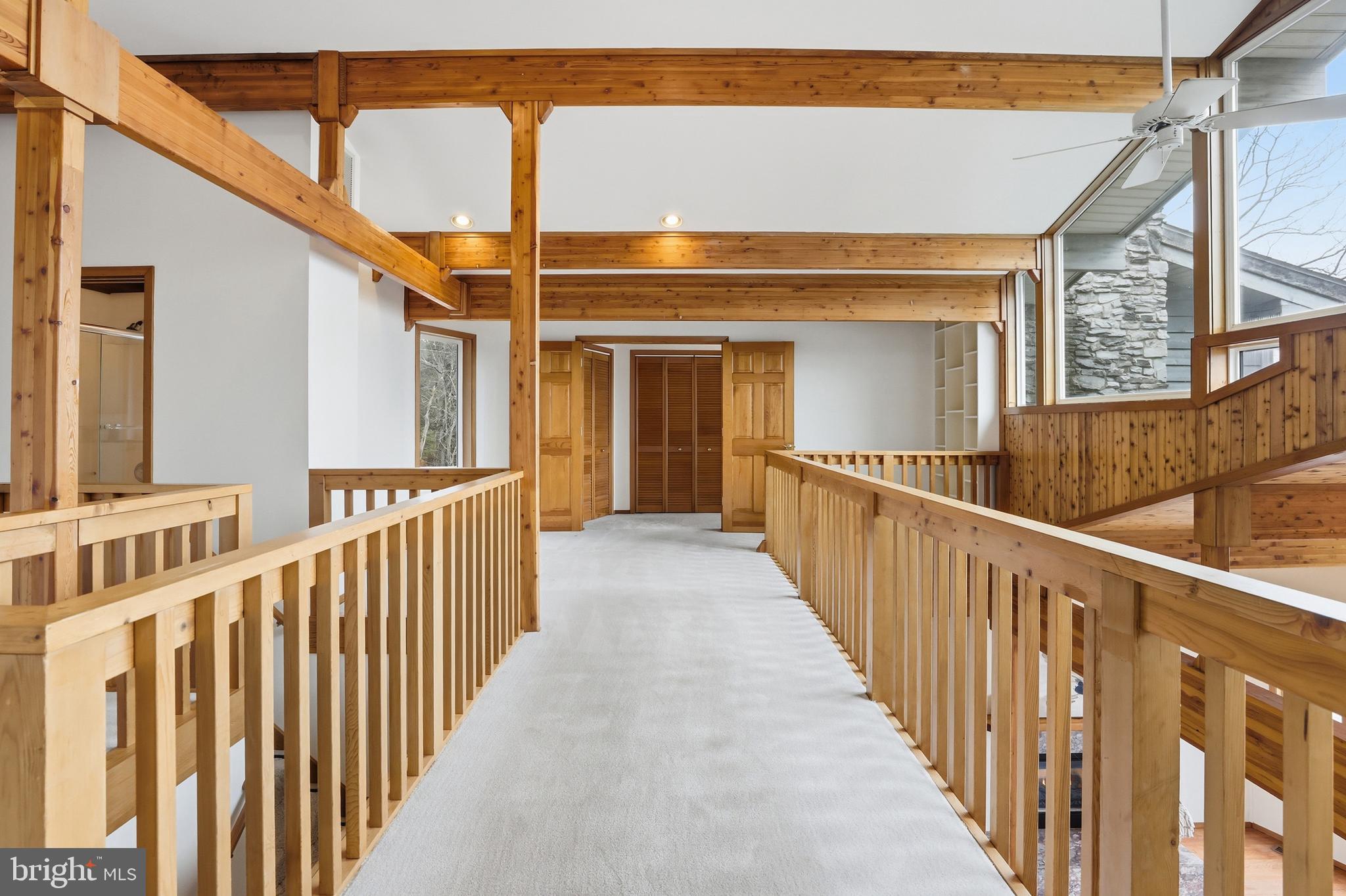 5931 Tyler Road Deale, MD 20751 - Photo 42 of 77 a view of a house with wooden stairs