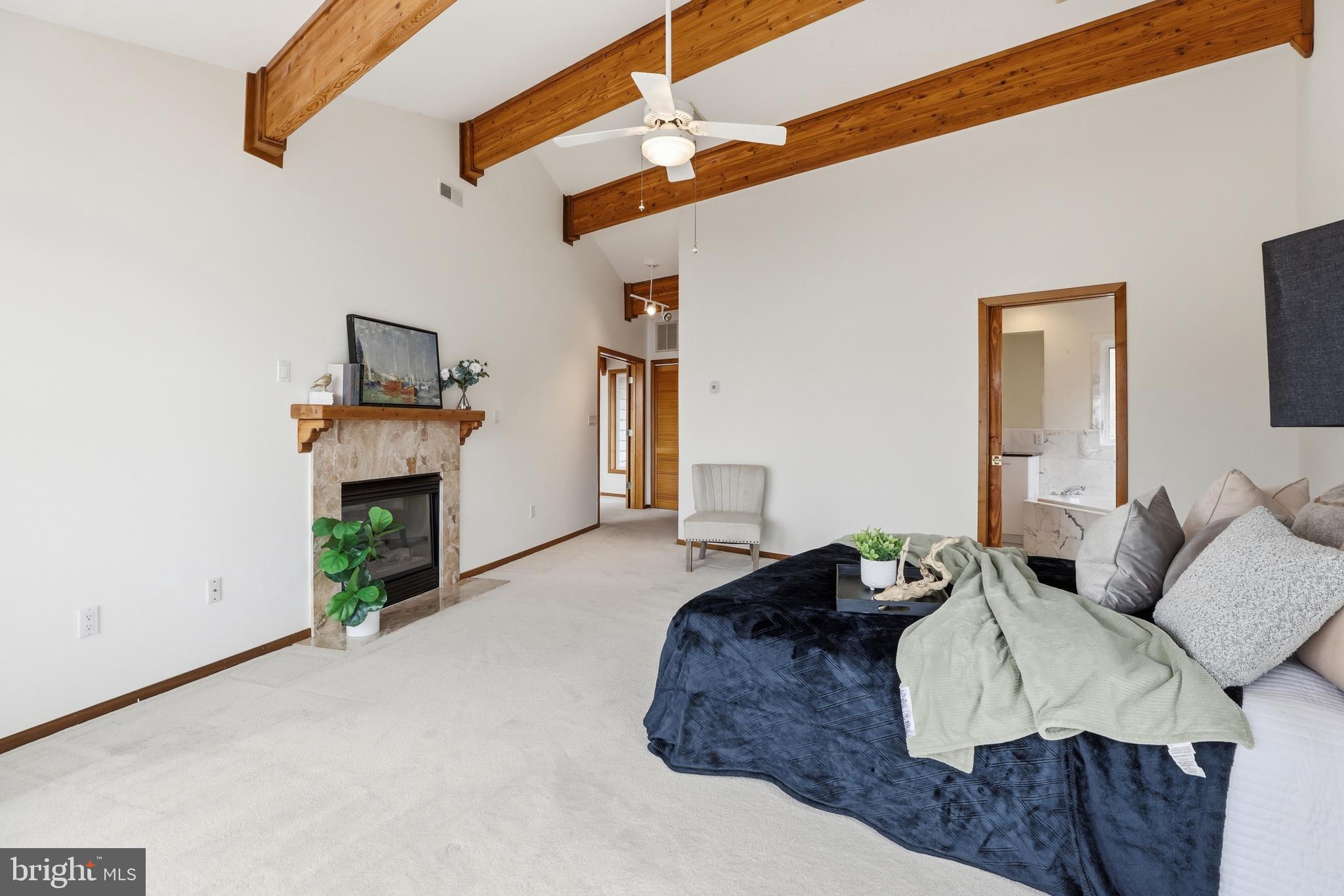 5931 Tyler Road Deale, MD 20751 - Photo 47 of 77 a living room with furniture and a fireplace