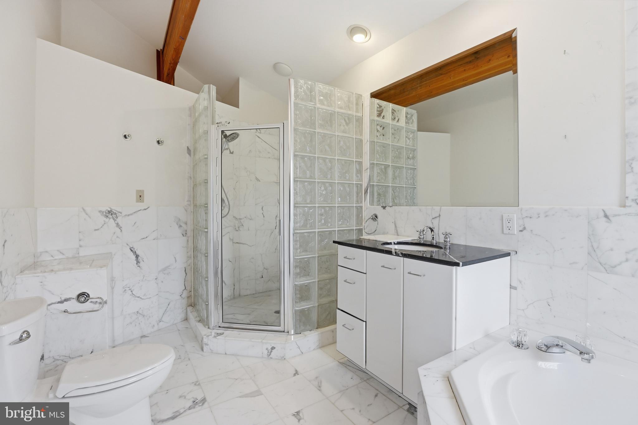 5931 Tyler Road Deale, MD 20751 - Photo 53 of 77 a bathroom with a sink toilet and shower