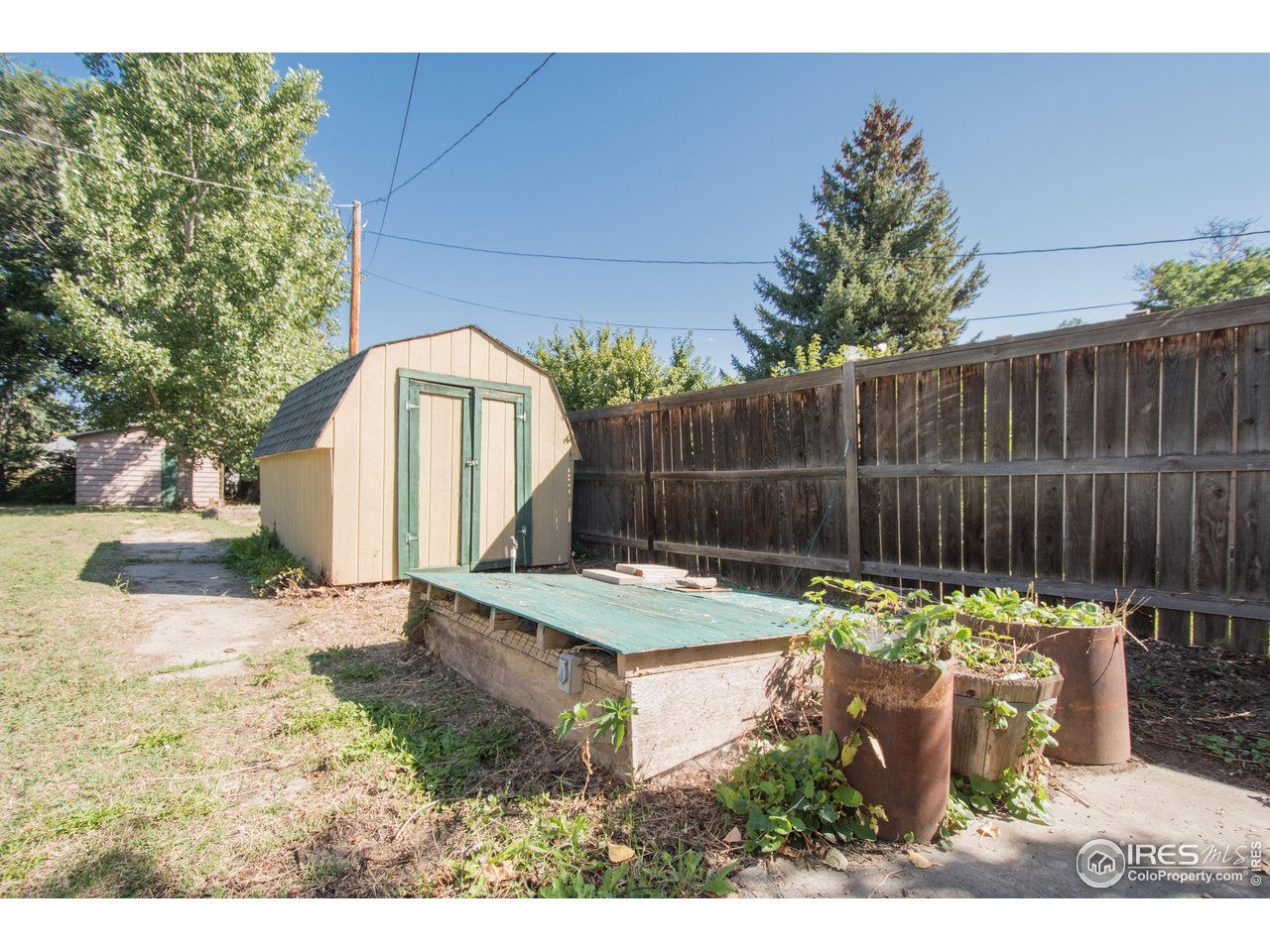 104 Oak Street Windsor, CO 80550 - Photo 25 of 31 Shed and City wellhead
