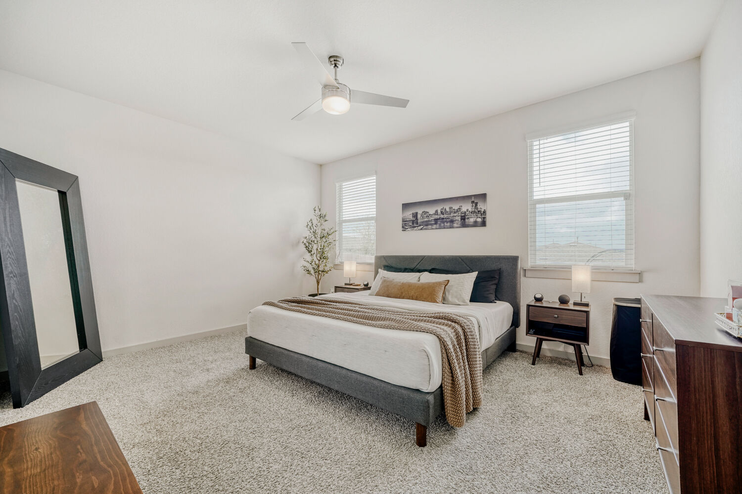 2308 Ranier Court Austin, TX 78754 - Photo 15 of 29 Bedroom featuring light colored carpet and a ceiling fan