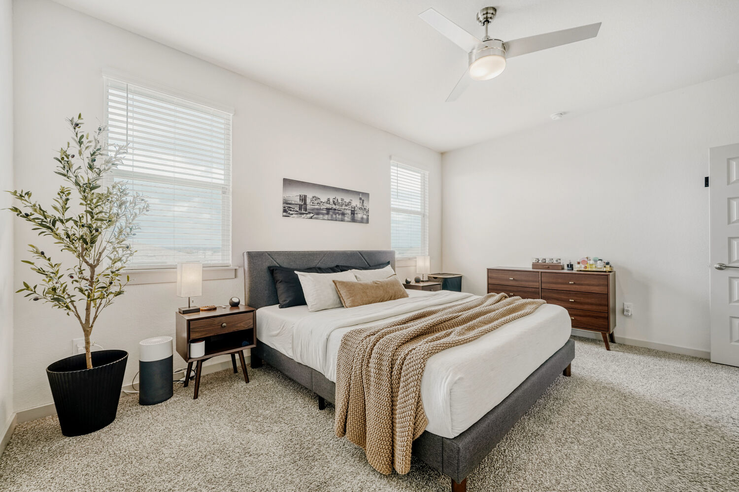 2308 Ranier Court Austin, TX 78754 - Photo 16 of 29 Bedroom featuring light carpet and ceiling fan