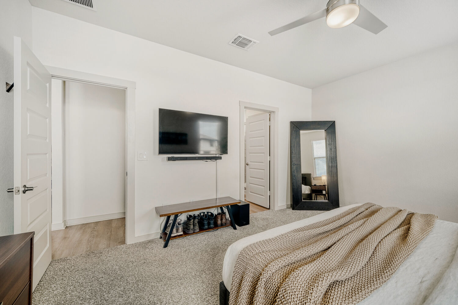 2308 Ranier Court Austin, TX 78754 - Photo 17 of 29 Bedroom featuring light carpet and ceiling fan