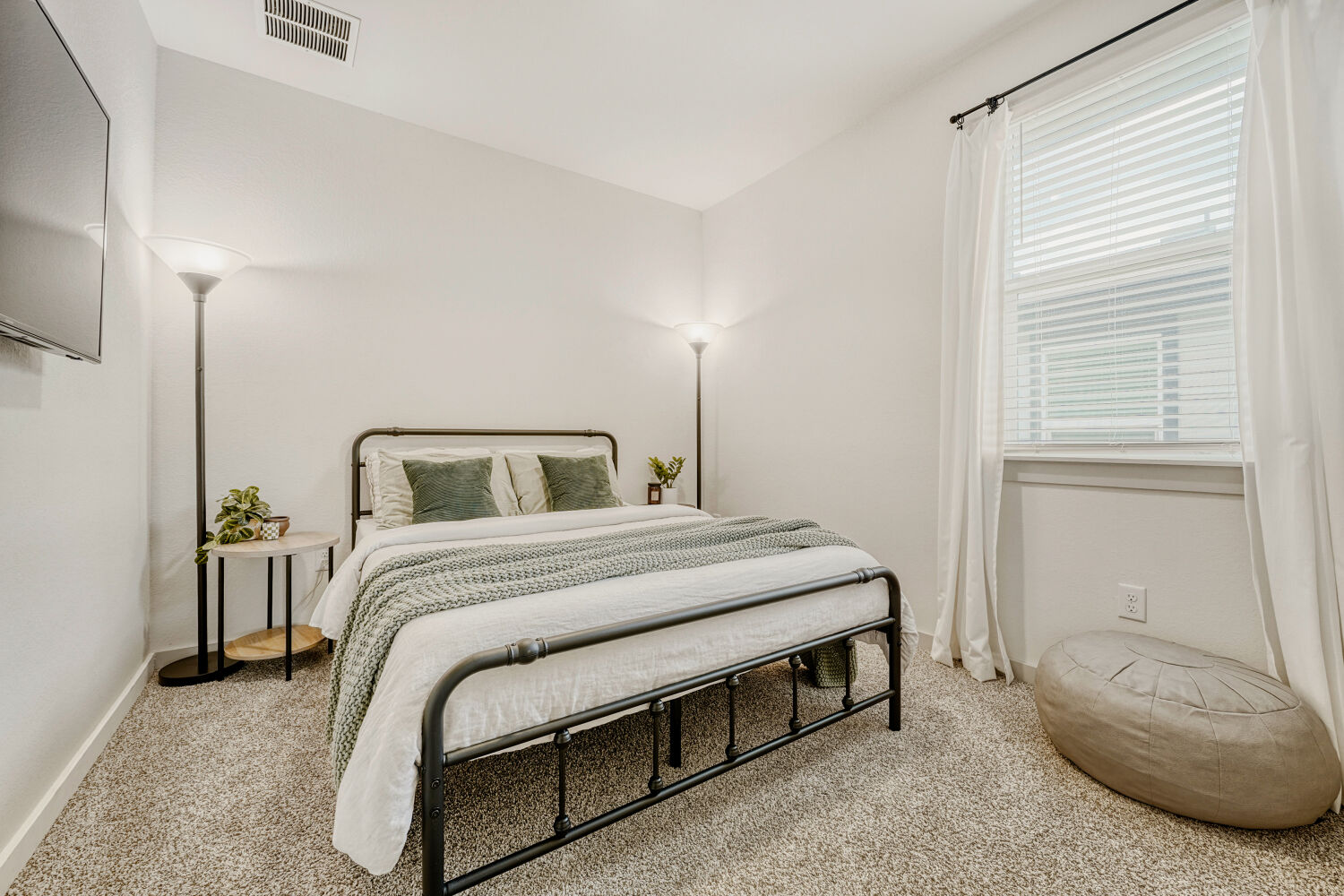 2308 Ranier Court Austin, TX 78754 - Photo 18 of 29 Bedroom with light colored carpet