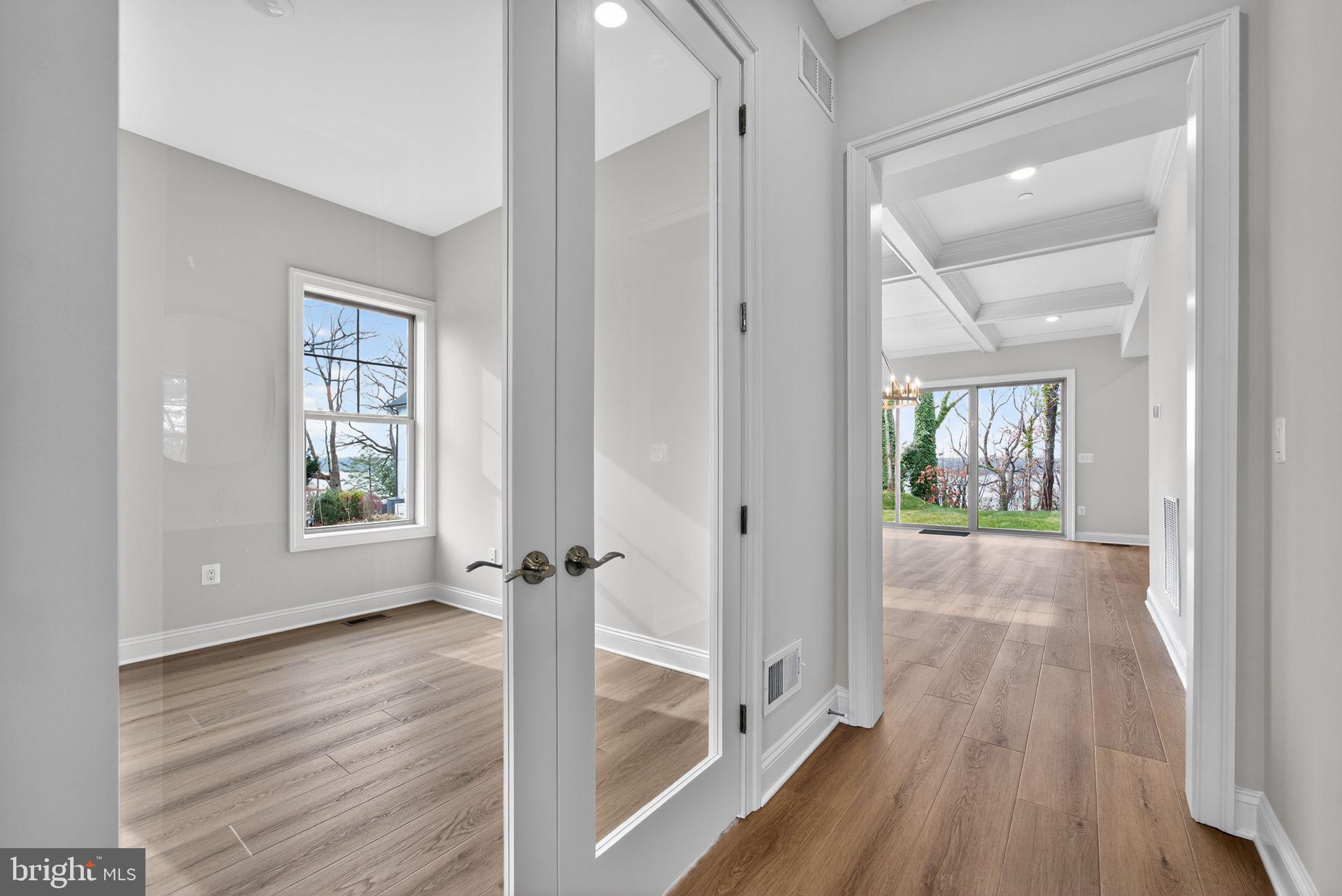 626 A Old County Road Severna Park, MD 21146 - Photo 15 of 52 a view of hallway with wooden floor and a window