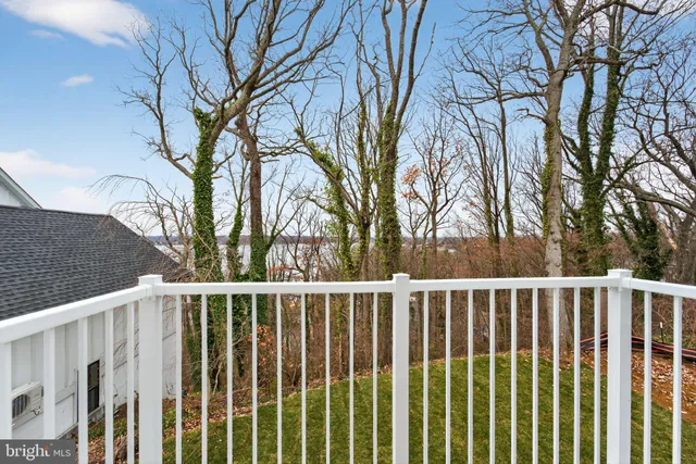 a bathroom with a bathtub and window