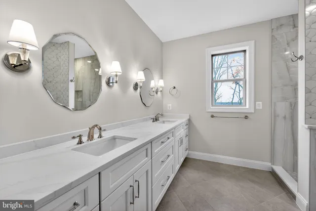 a bathroom with a toilet and a sink