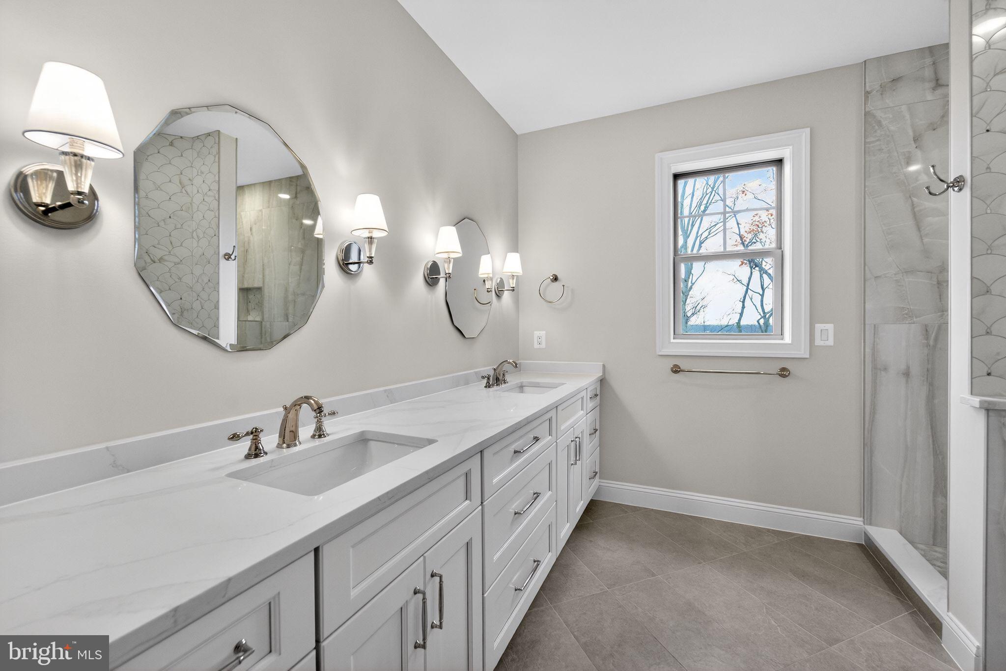 626 A Old County Road Severna Park, MD 21146 - Photo 24 of 52 a spacious bathroom with 2 sink and a mirror