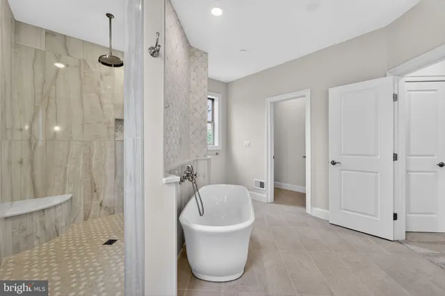 a view of a room with shelves on the wall