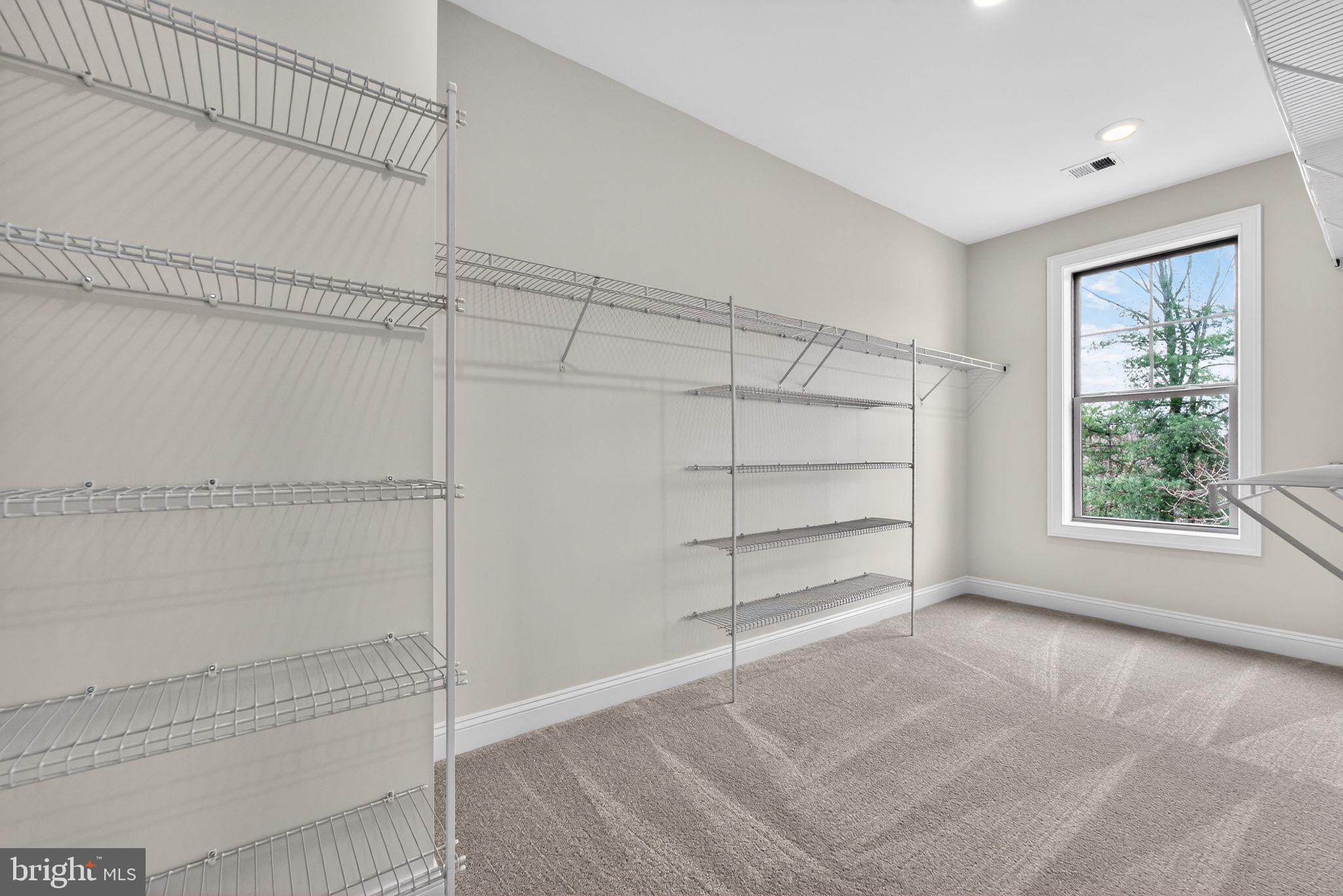 626 A Old County Road Severna Park, MD 21146 - Photo 26 of 52 a view of a room with shelves on the wall
