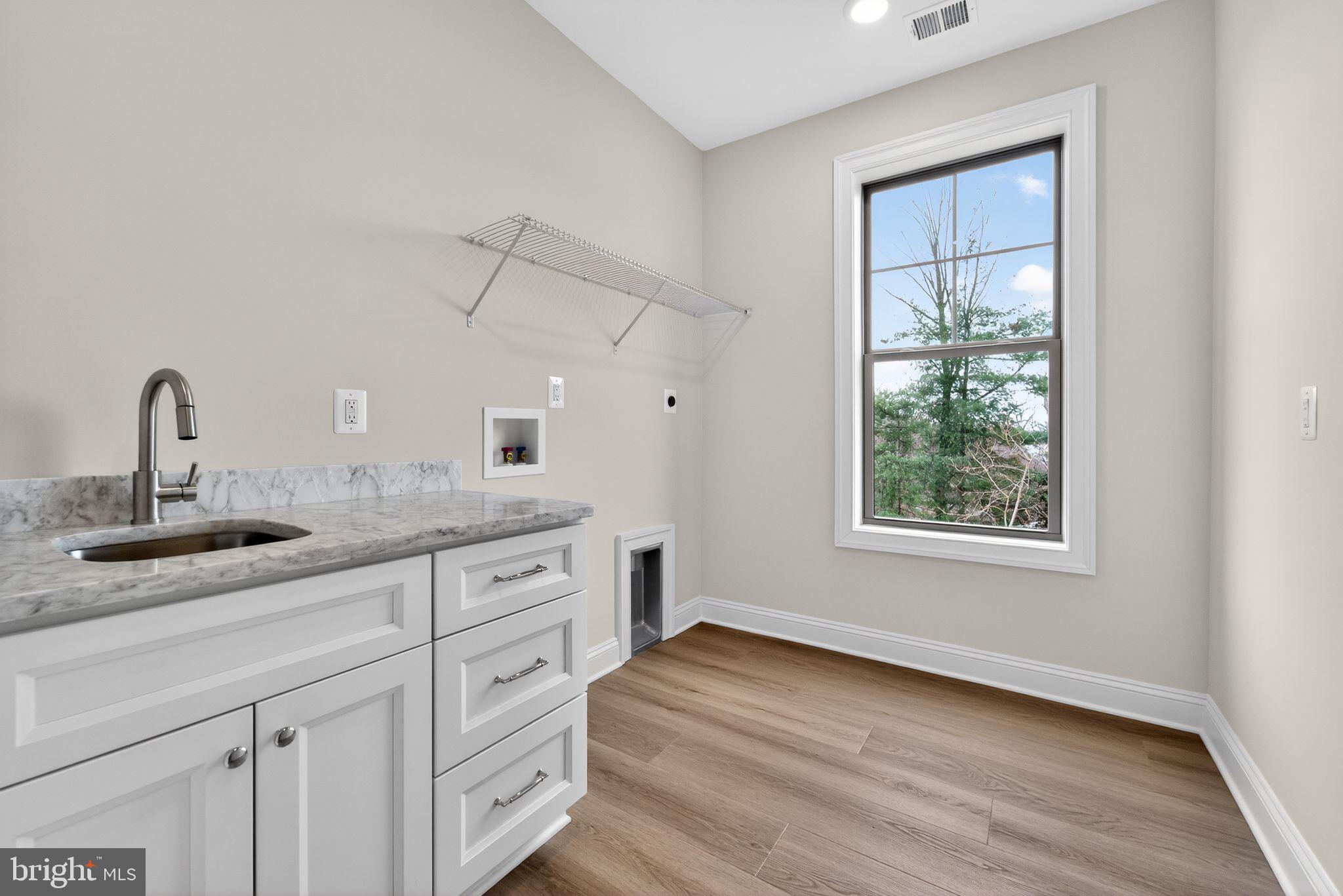 626 A Old County Road Severna Park, MD 21146 - Photo 35 of 52 a kitchen with sink and cabinets
