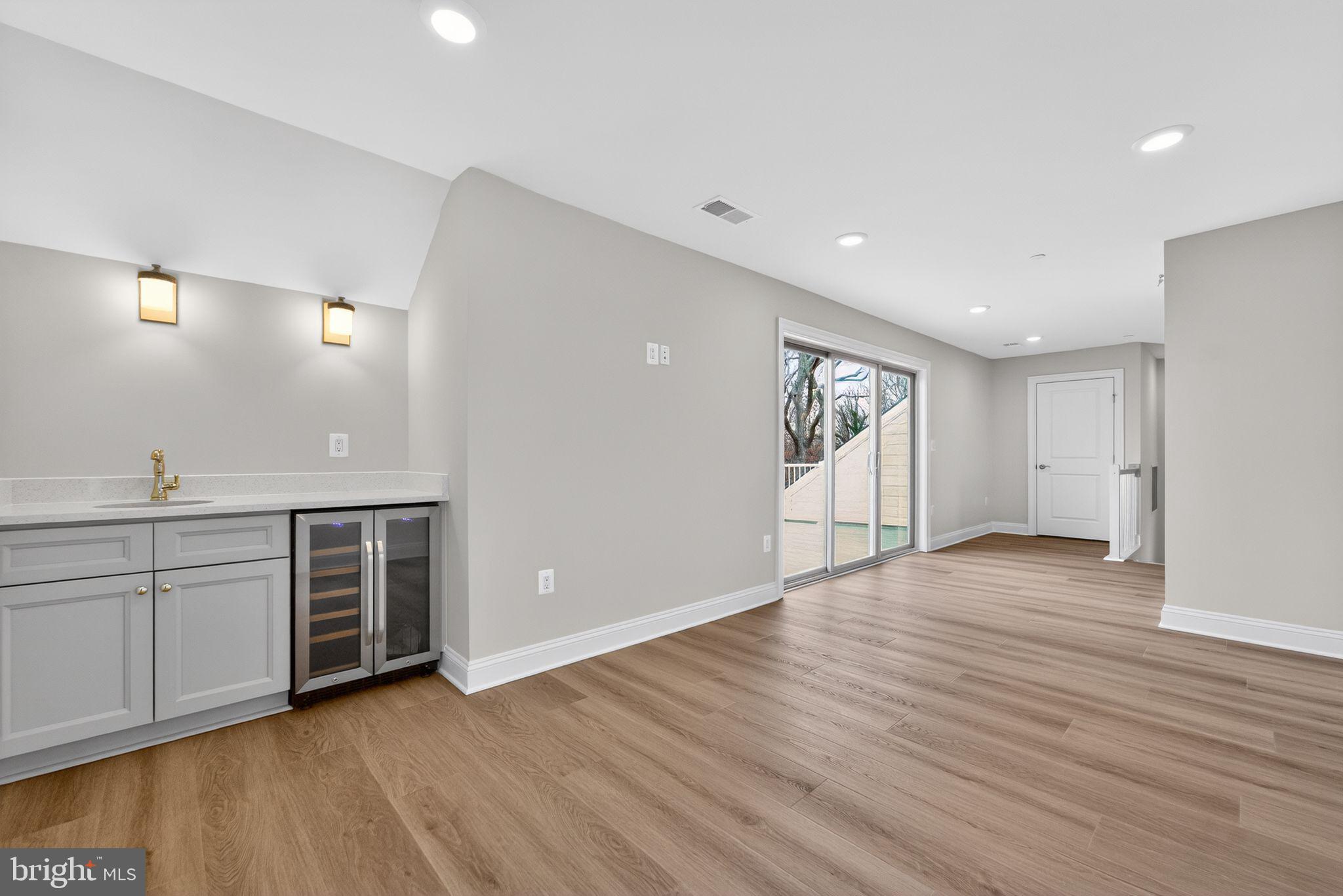 626 A Old County Road Severna Park, MD 21146 - Photo 39 of 52 a view of an empty room with window and wooden floor