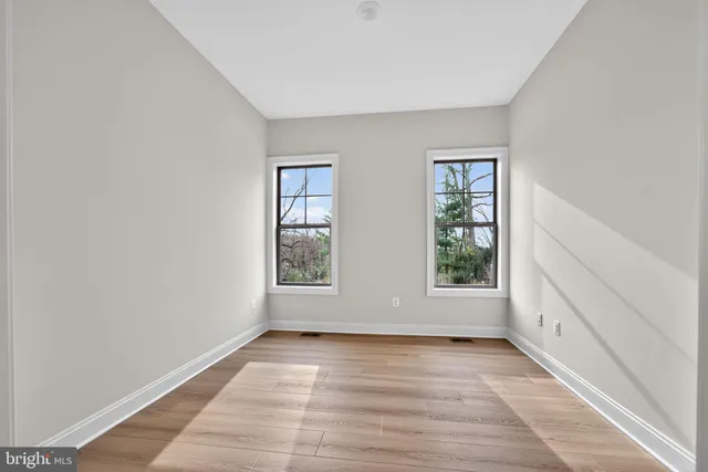 a view of entryway with wooden floor