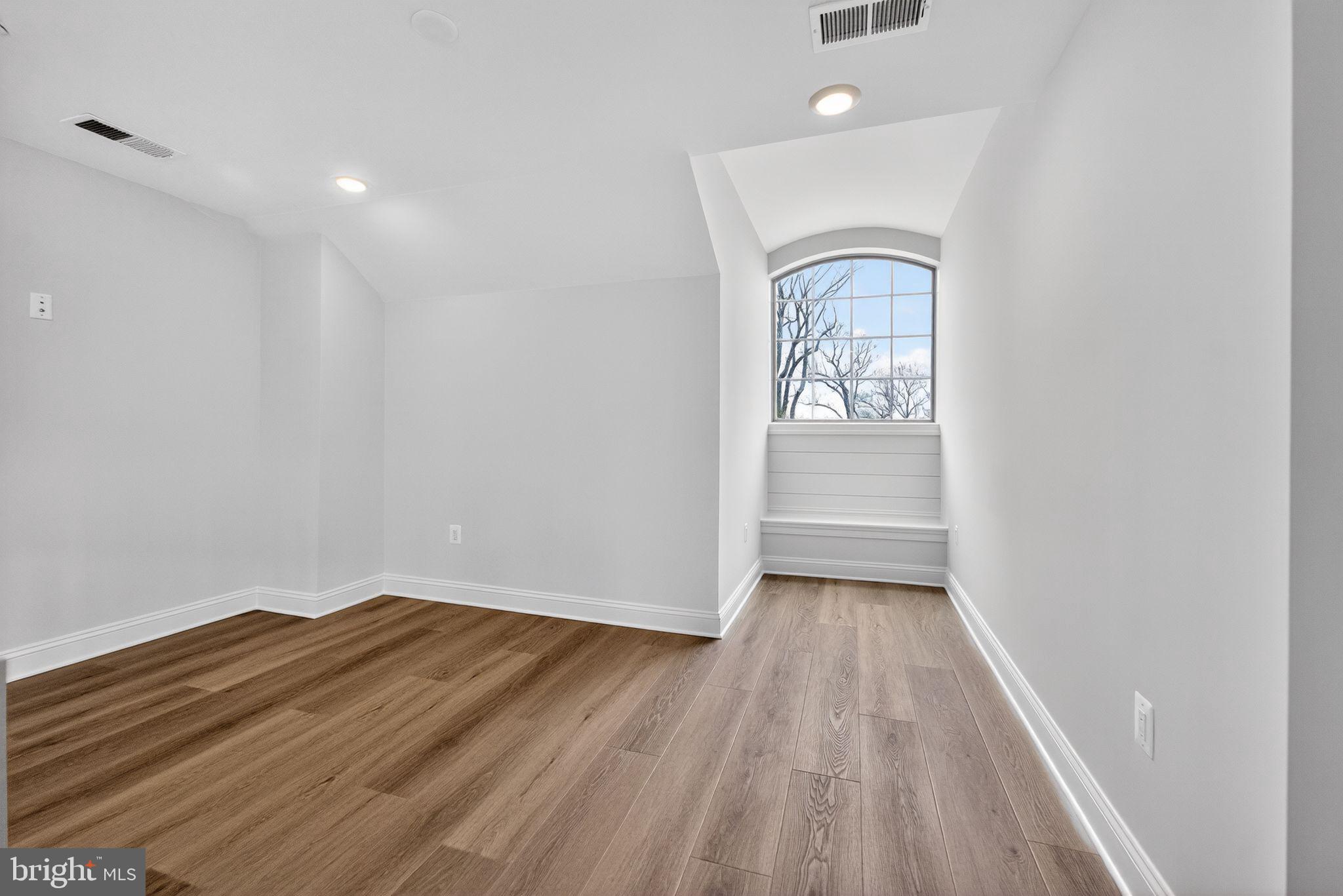 626 A Old County Road Severna Park, MD 21146 - Photo 43 of 52 a view of empty room with wooden floor and fan