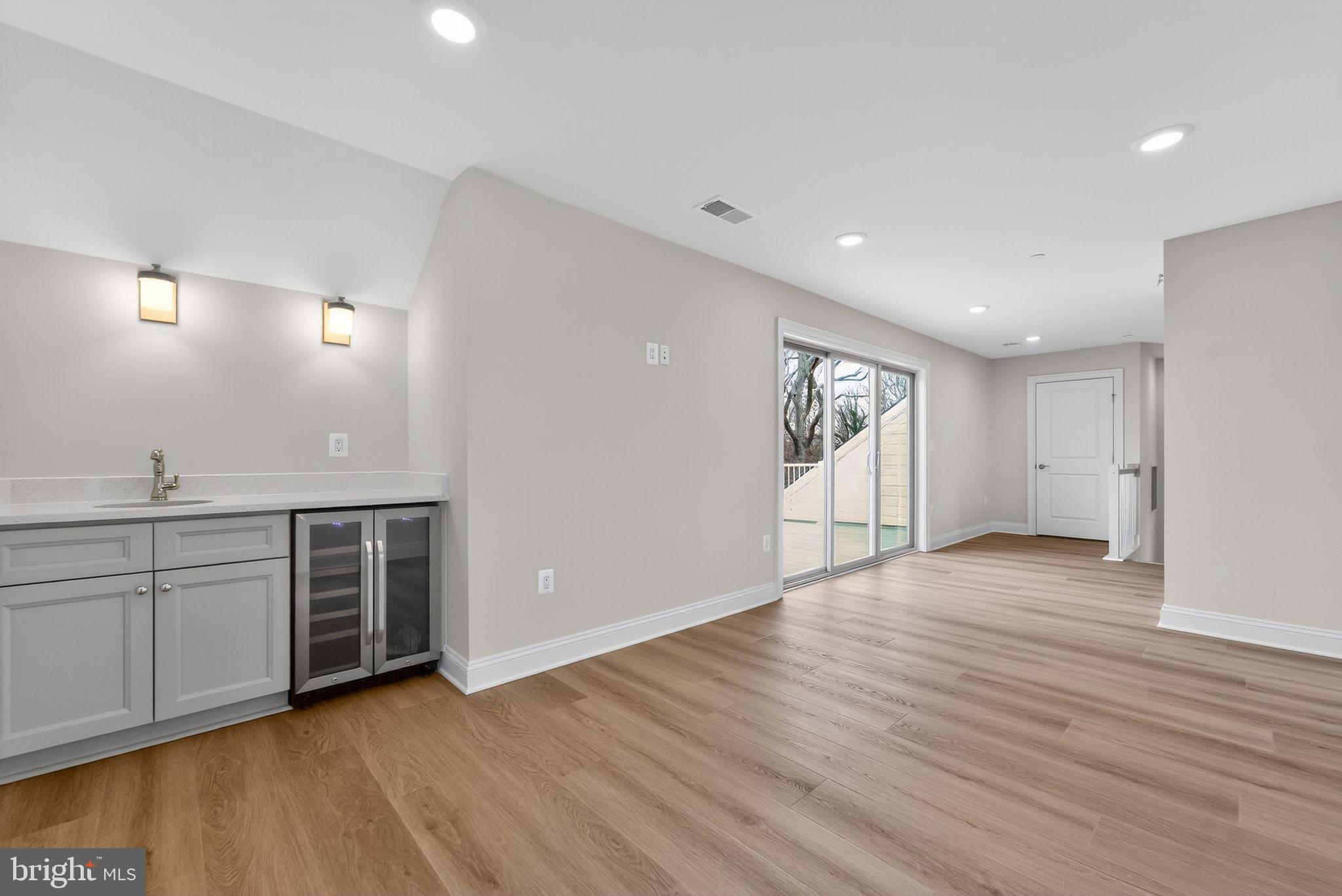 626 A Old County Road Severna Park, MD 21146 - Photo 44 of 52 a view of an empty room with window and wooden floor