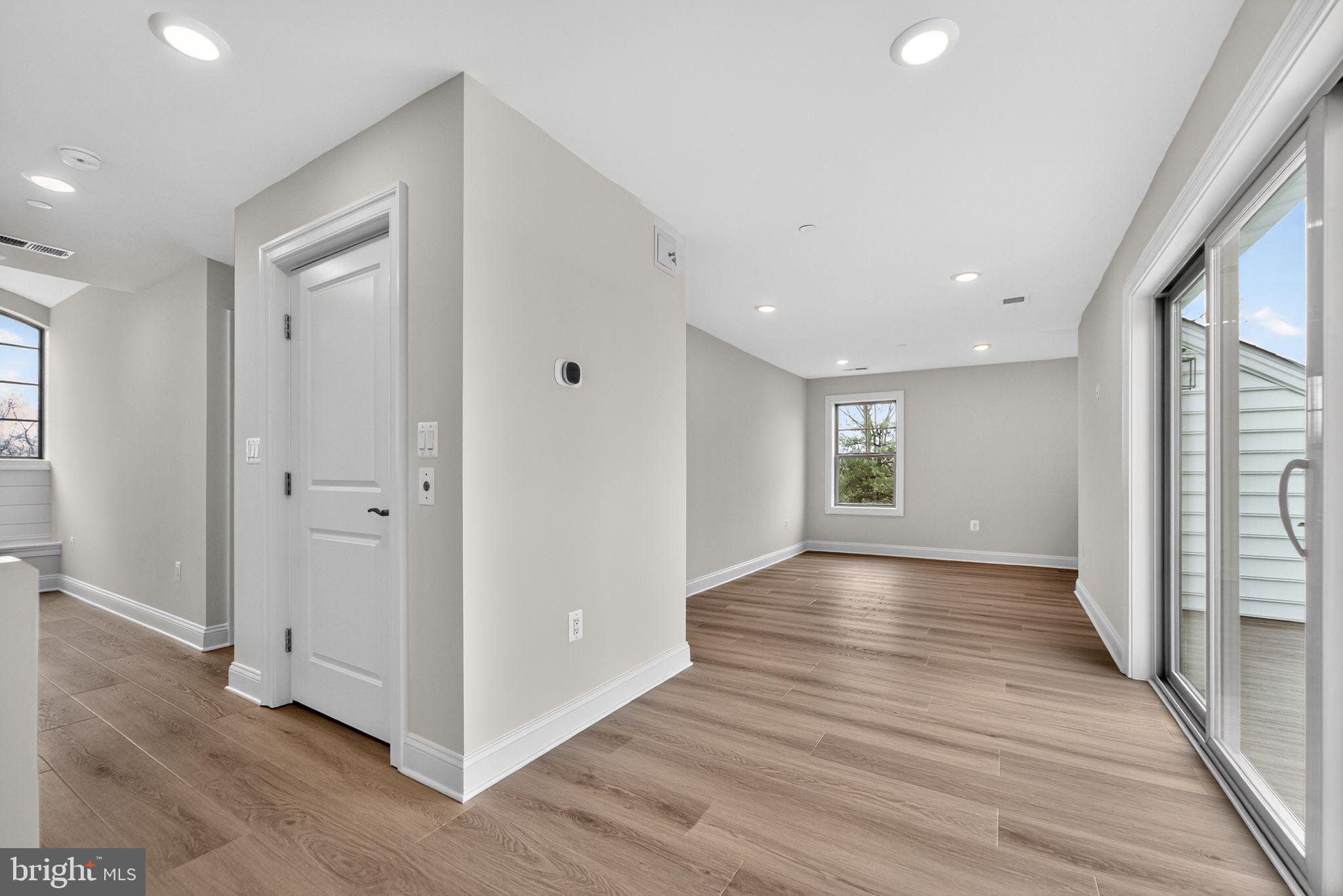 626 A Old County Road Severna Park, MD 21146 - Photo 45 of 52 a view of an empty room with wooden floor and a window