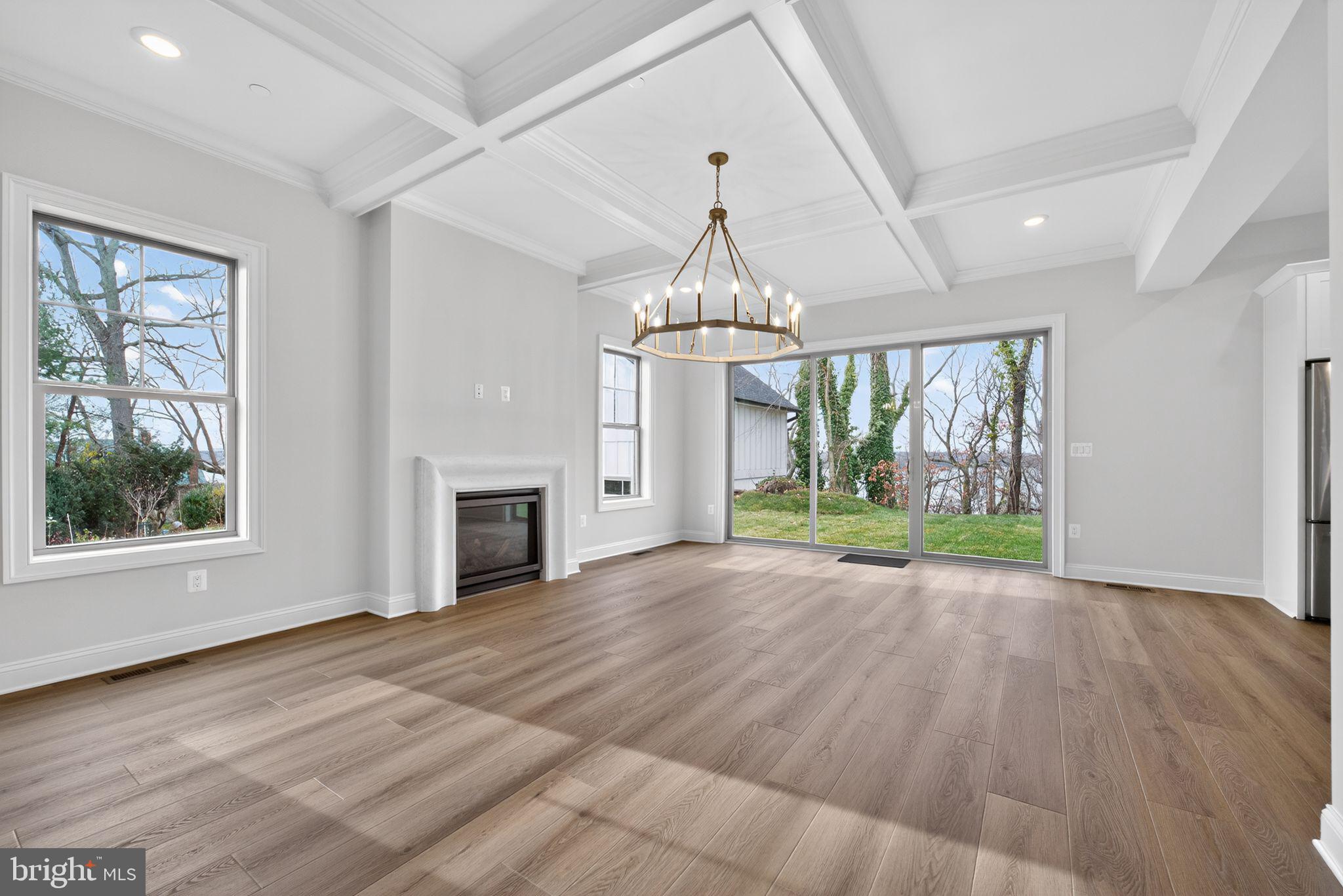 626 A Old County Road Severna Park, MD 21146 - Photo 5 of 52 a view of empty room with wooden floor and fireplace