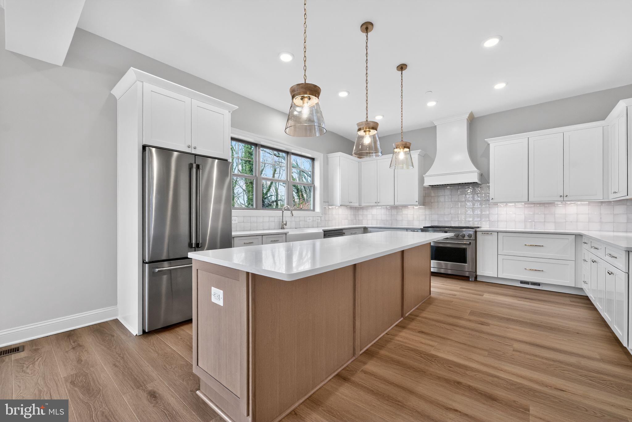 626 A Old County Road Severna Park, MD 21146 - Photo 9 of 52 a kitchen with stainless steel appliances granite countertop a sink stove and refrigerator