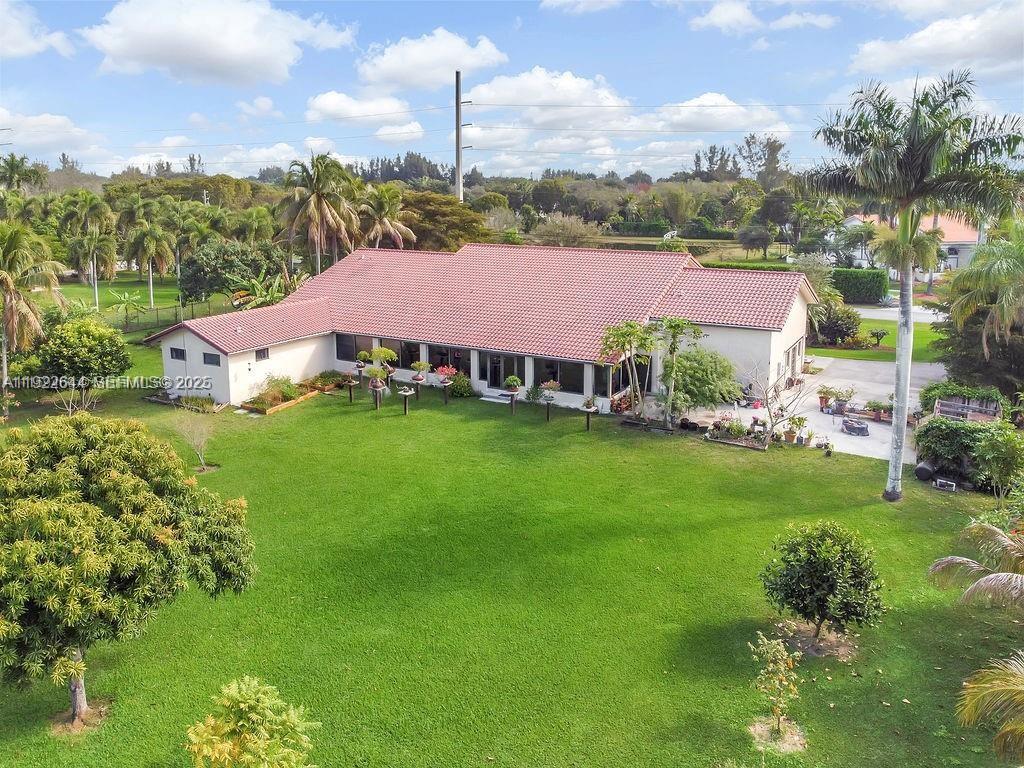 5425 Southwest 190th Avenue Southwest Ranches, FL 33332 - Photo 42 of 56 a view of a house with a garden