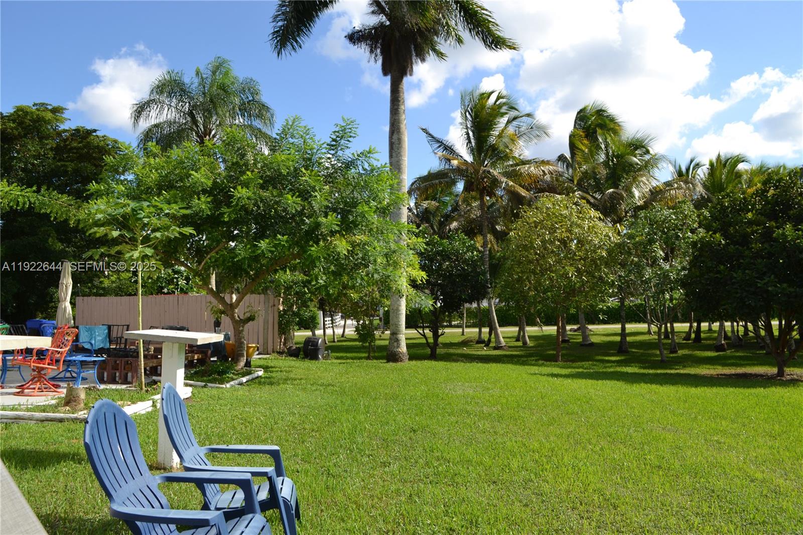 5425 Southwest 190th Avenue Southwest Ranches, FL 33332 - Photo 53 of 56 a view of a golf course with chairs