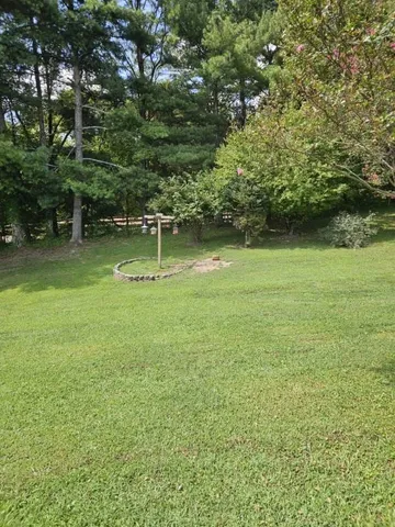 a swimming pool with wooden fence