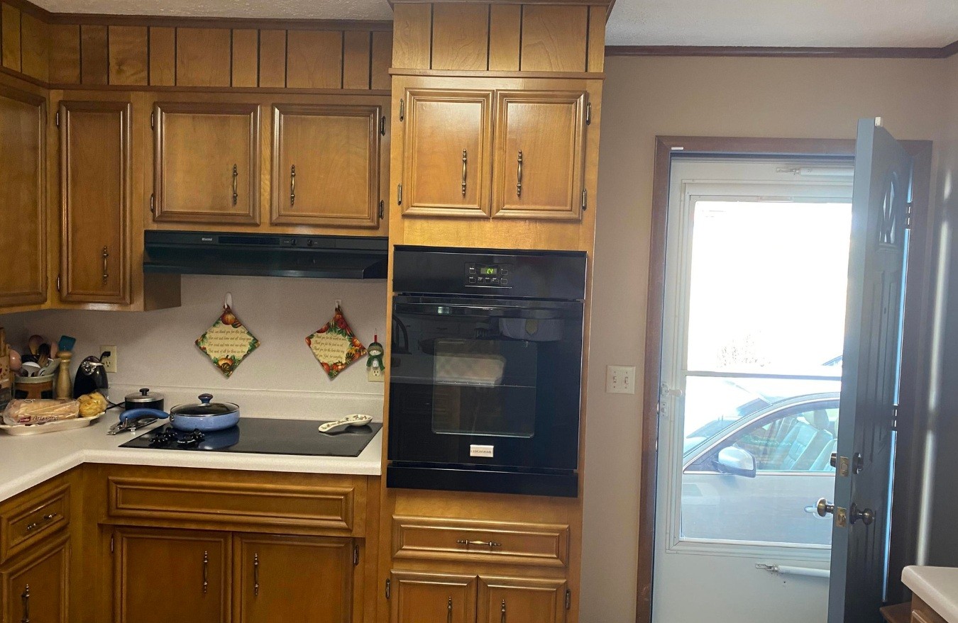 929 Nantucket Avenue Mount Carmel, TN 37645 - Photo 6 of 15 a kitchen with a refrigerator and cabinets