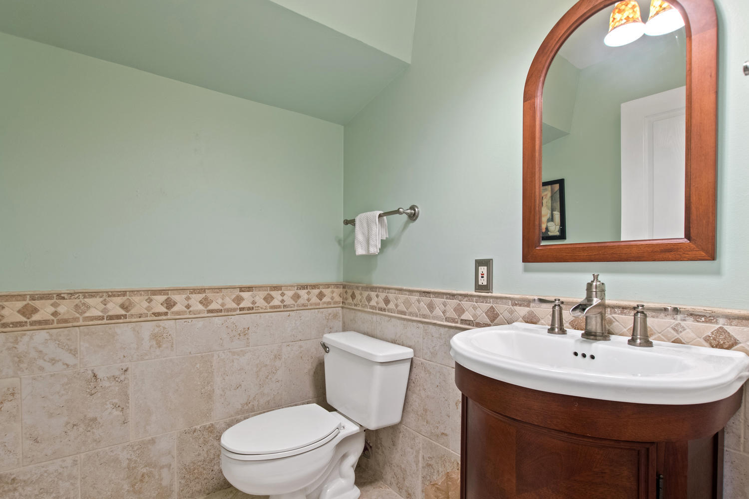 1350 C Road Loxahatchee Groves, FL 33470 - Photo 15 of 27 a bathroom with a toilet a sink and mirror