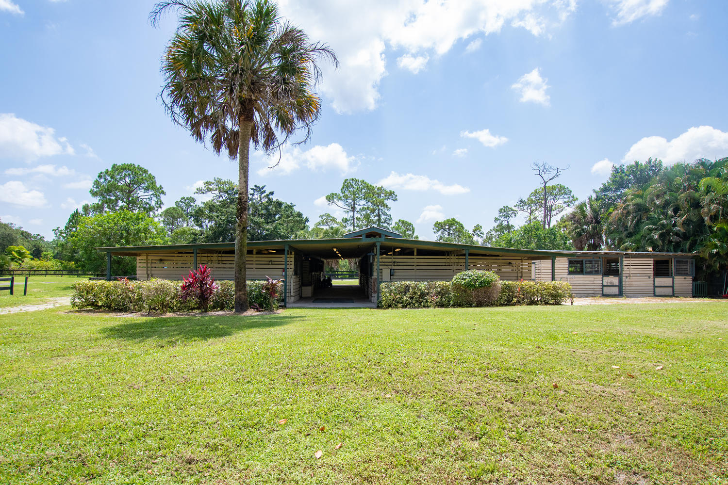1350 C Road Loxahatchee Groves, FL 33470 - Photo 17 of 27 a view of patio with swimming pool and green space