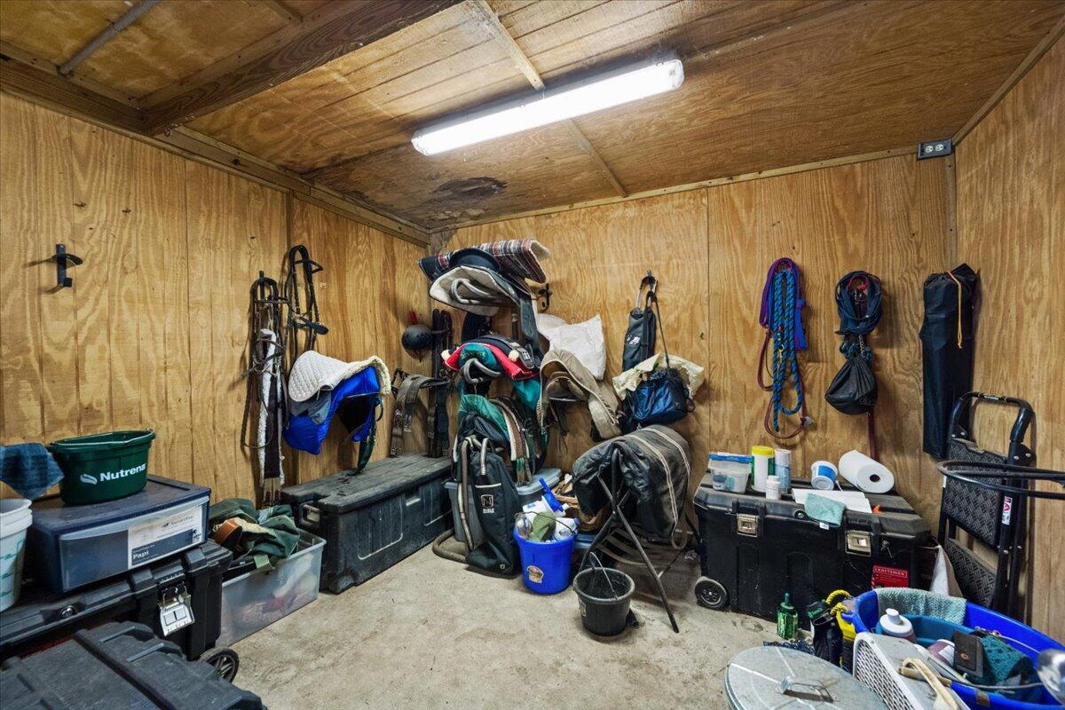 1350 C Road Loxahatchee Groves, FL 33470 - Photo 21 of 27 a view of a storage room with lots of stuff