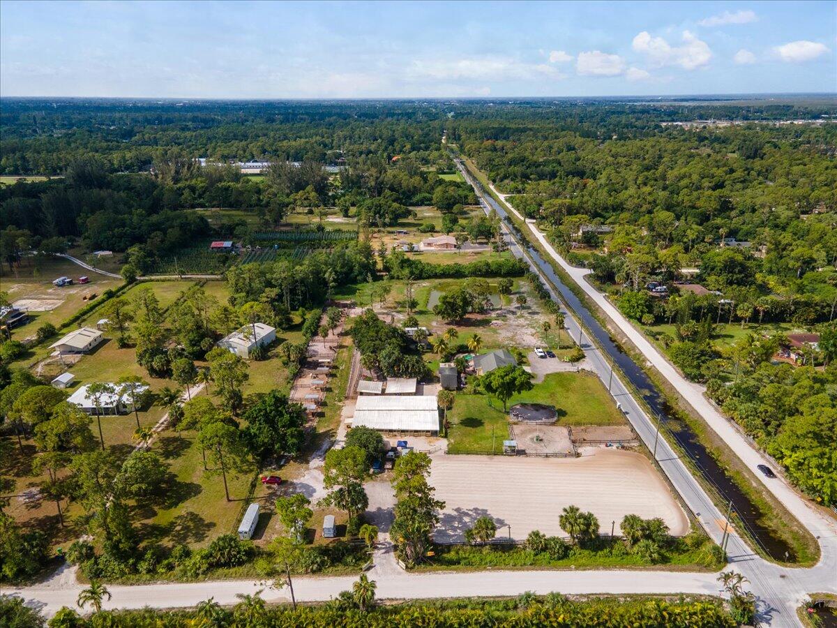 1350 C Road Loxahatchee Groves, FL 33470 - Photo 27 of 27 an aerial view of residential houses with outdoor space