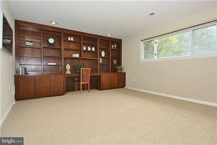 305 Irwin Street Silver Spring, MD 20901 - Photo 18 of 23 a view of an empty room with cabinet