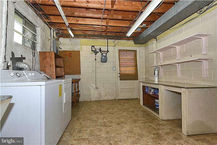 305 Irwin Street Silver Spring, MD 20901 - Photo 19 of 23 a utility room with dryer and washer