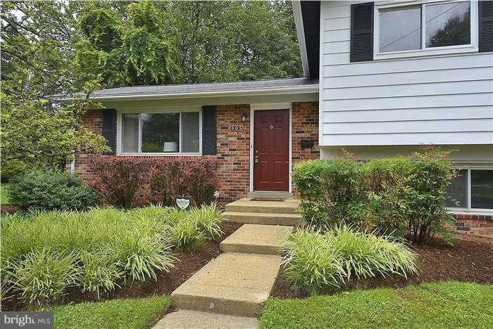 305 Irwin Street Silver Spring, MD 20901 - Photo 20 of 23 a view of house with a yard and sitting space