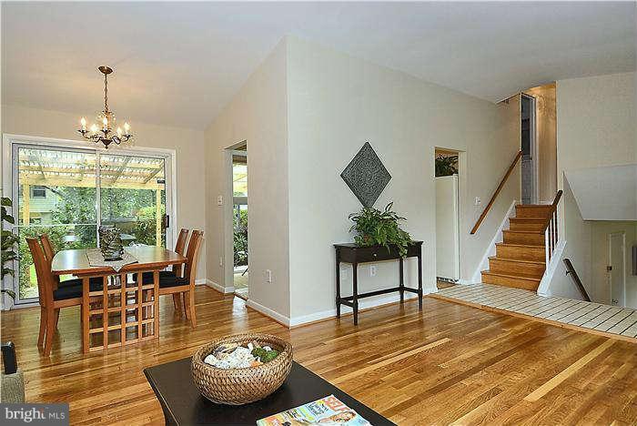 305 Irwin Street Silver Spring, MD 20901 - Photo 4 of 23 a living room with furniture and wooden floor