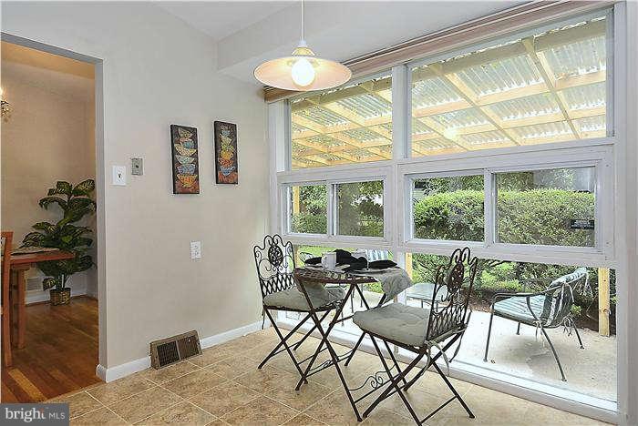 305 Irwin Street Silver Spring, MD 20901 - Photo 6 of 23 a dining room with furniture and window