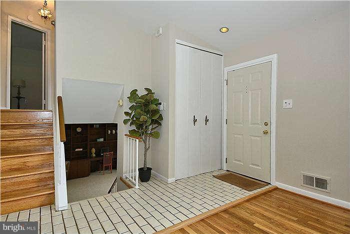 305 Irwin Street Silver Spring, MD 20901 - Photo 9 of 23 a view of a bedroom from a hallway