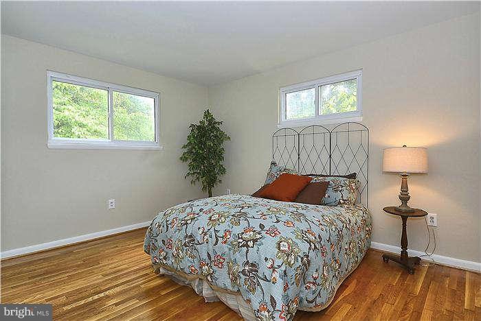 305 Irwin Street Silver Spring, MD 20901 - Photo 10 of 23 a bedroom with a bed and a window